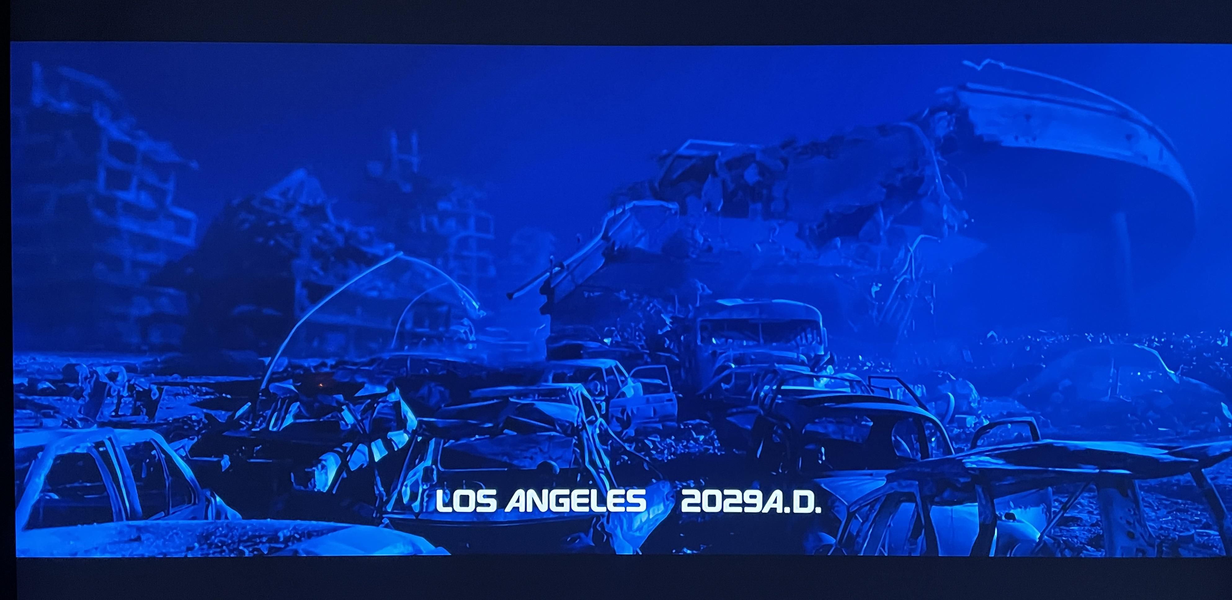 Scene from the movie Terminator 2 showing a destroyed landscape with the text "Los Angeles 2029 A.D."
